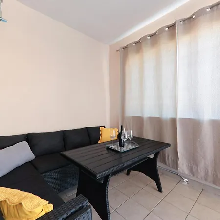 In Apartment *